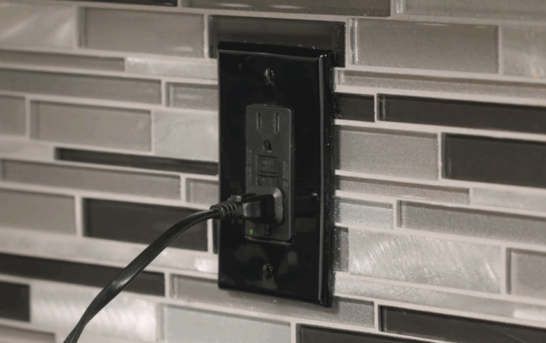 An image of a GCFI electrical outlet in a kitchen