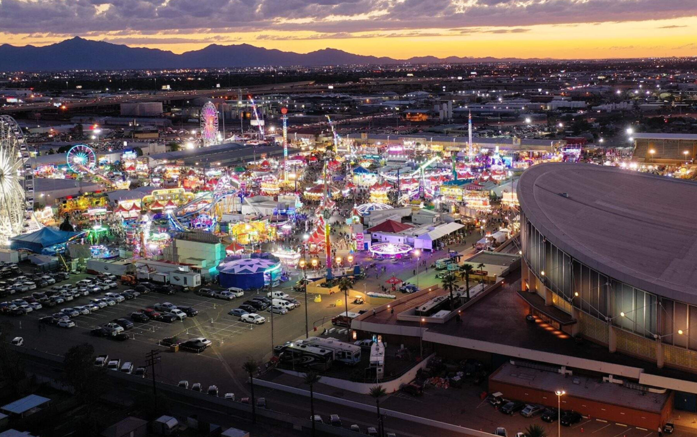 Arizona State Fair carnival rides and games during fall activities in Phoenix