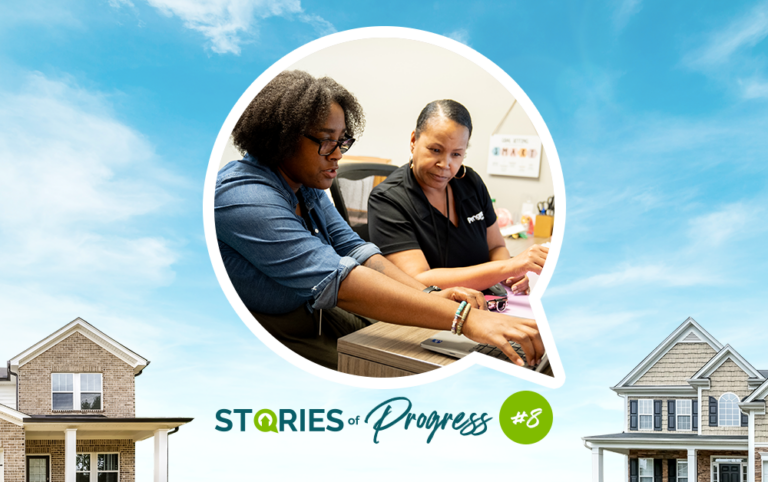 Stories of Progress featured image showing two team members working together at a desk,