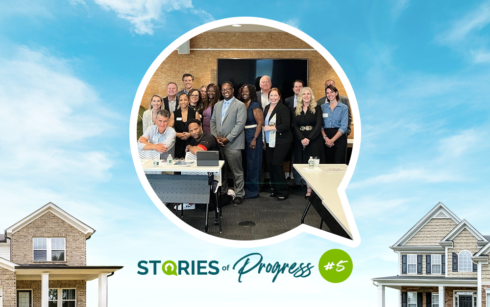 Stories of Progress blog image featuring participants at a Charlotte housing roundtable dedicated to advancing affordable housing, community collaboration, and housing policy discussions.